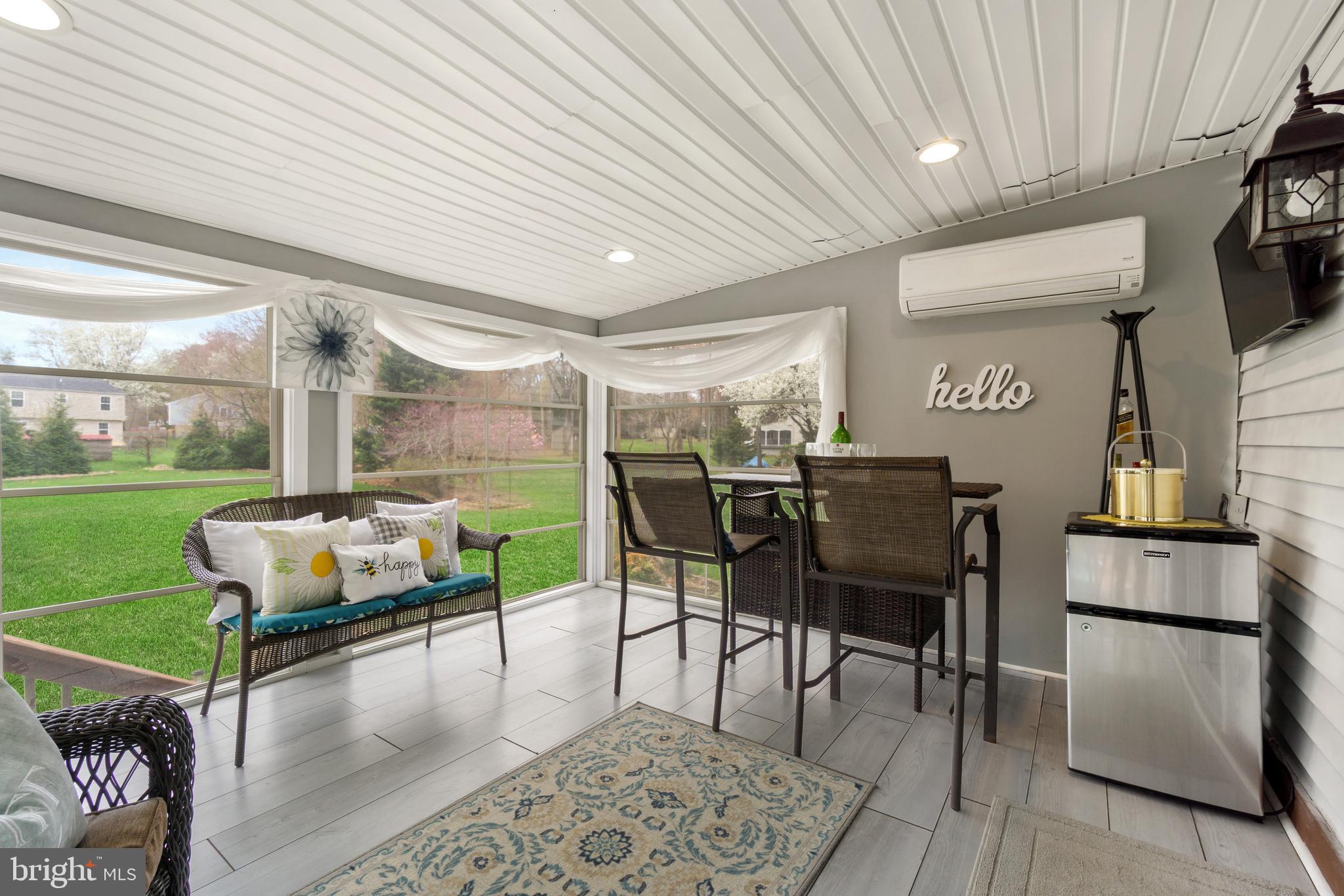 8339 Capel Drive Pasadena, MD 21122 - Photo 23 of 51 a patio with table and chairs