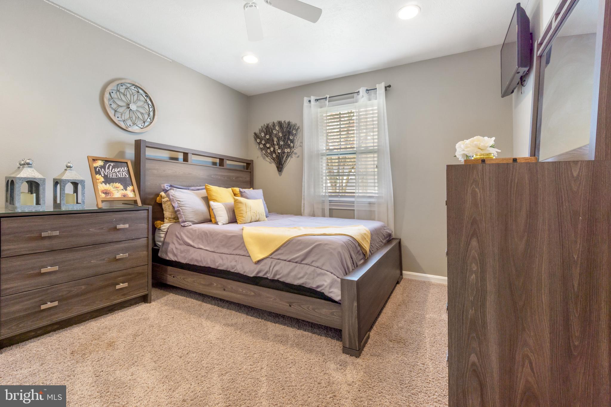 8339 Capel Drive Pasadena, MD 21122 - Photo 31 of 51 a bedroom with a bed and a window