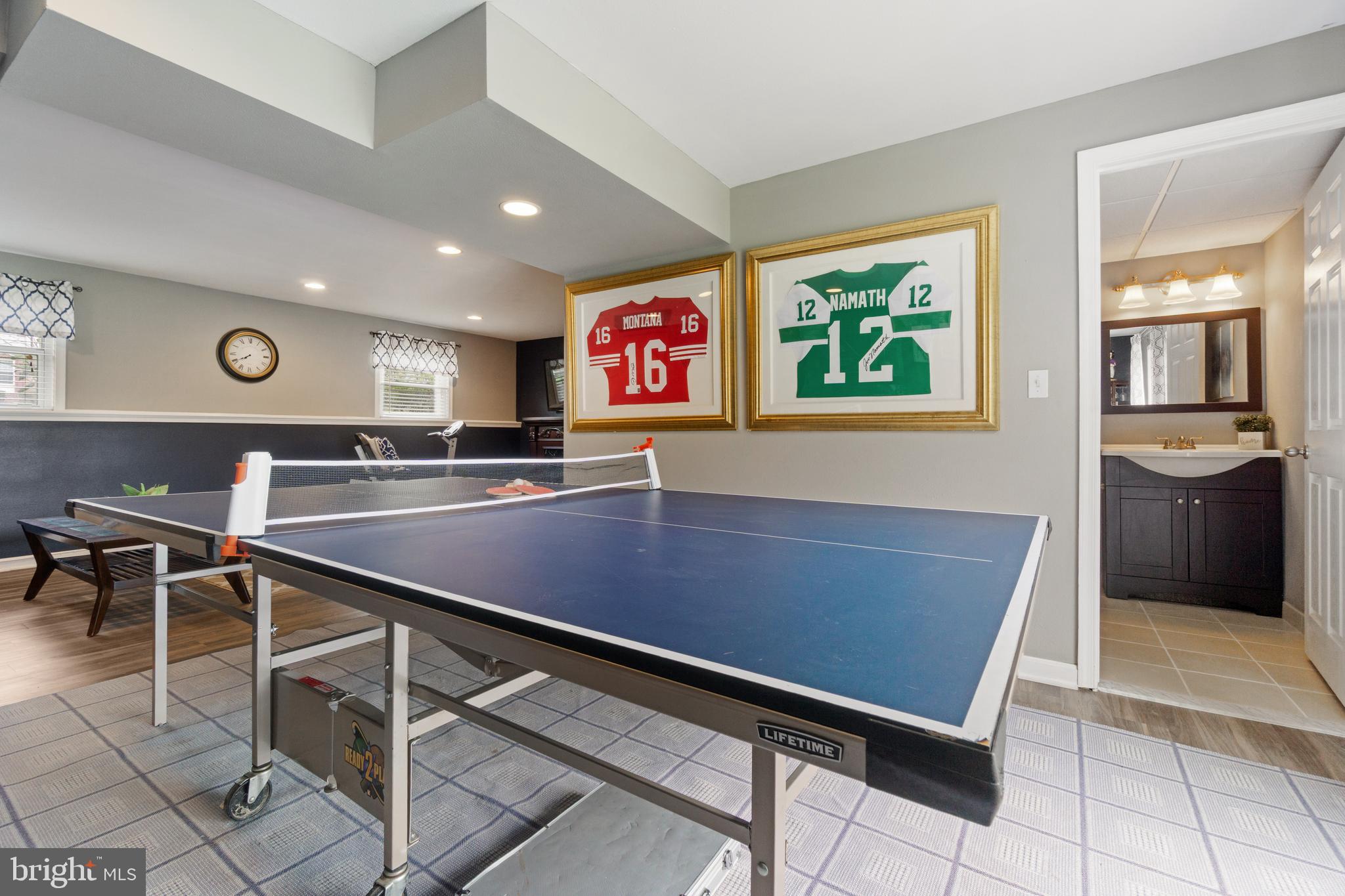 8339 Capel Drive Pasadena, MD 21122 - Photo 41 of 51 a room with table chairs and stainless steel appliances