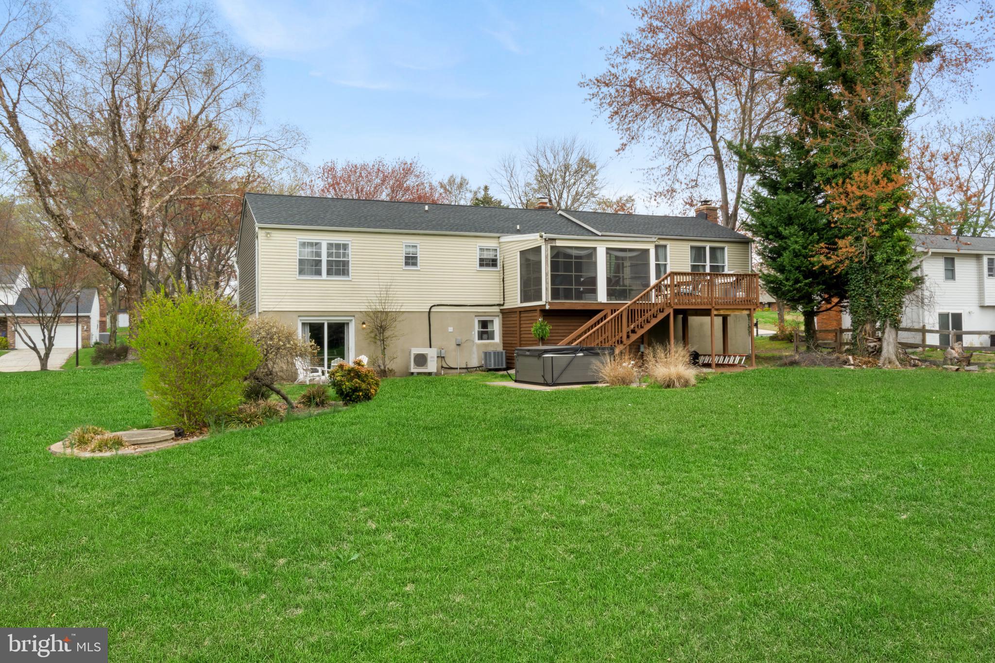 8339 Capel Drive Pasadena, MD 21122 - Photo 49 of 51 a view of a house with a backyard porch and sitting area