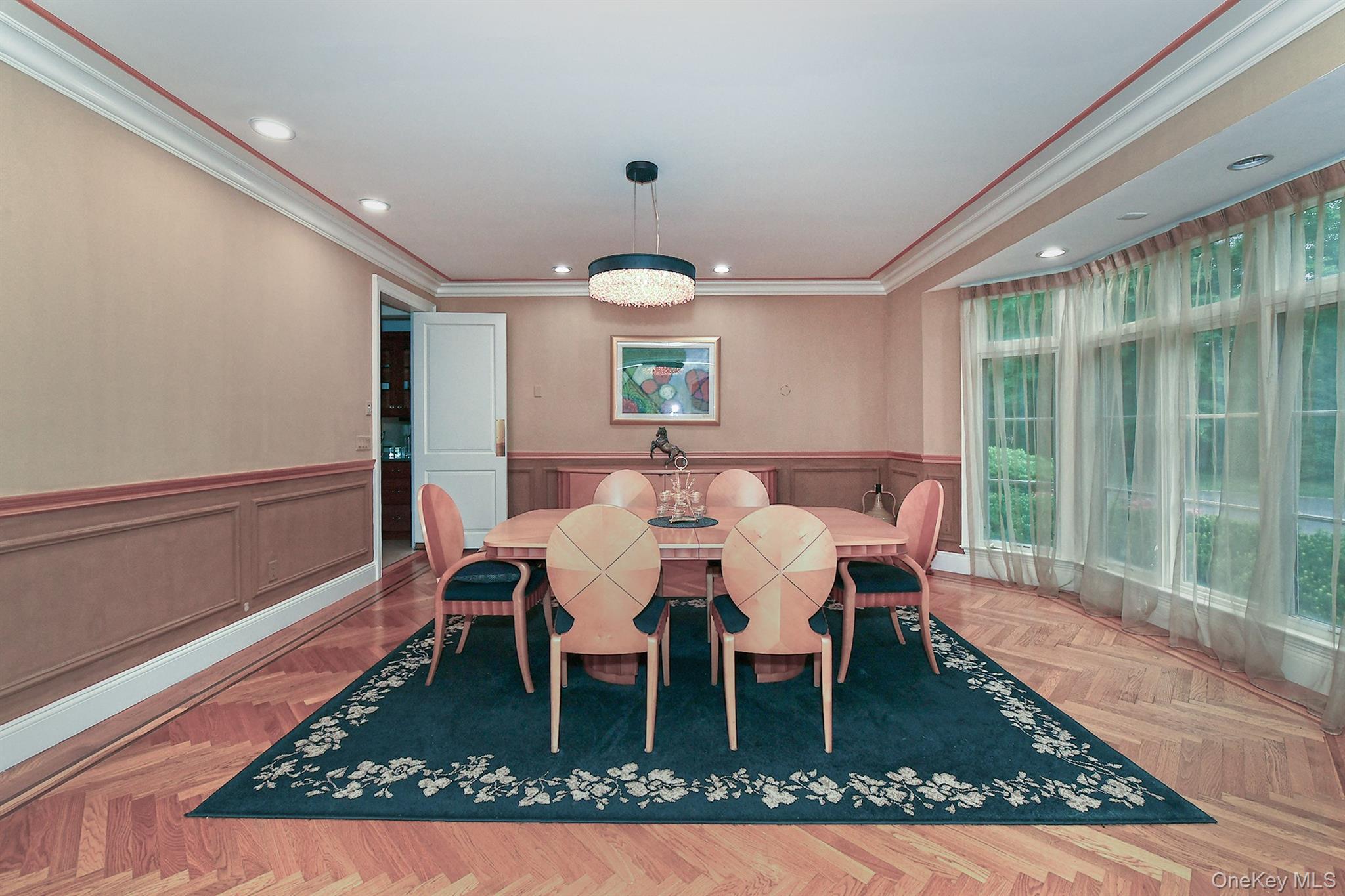 14 Norgate Road Glen Head, NY 11545 - Photo 13 of 44 a dining room with wooden floor and a rug
