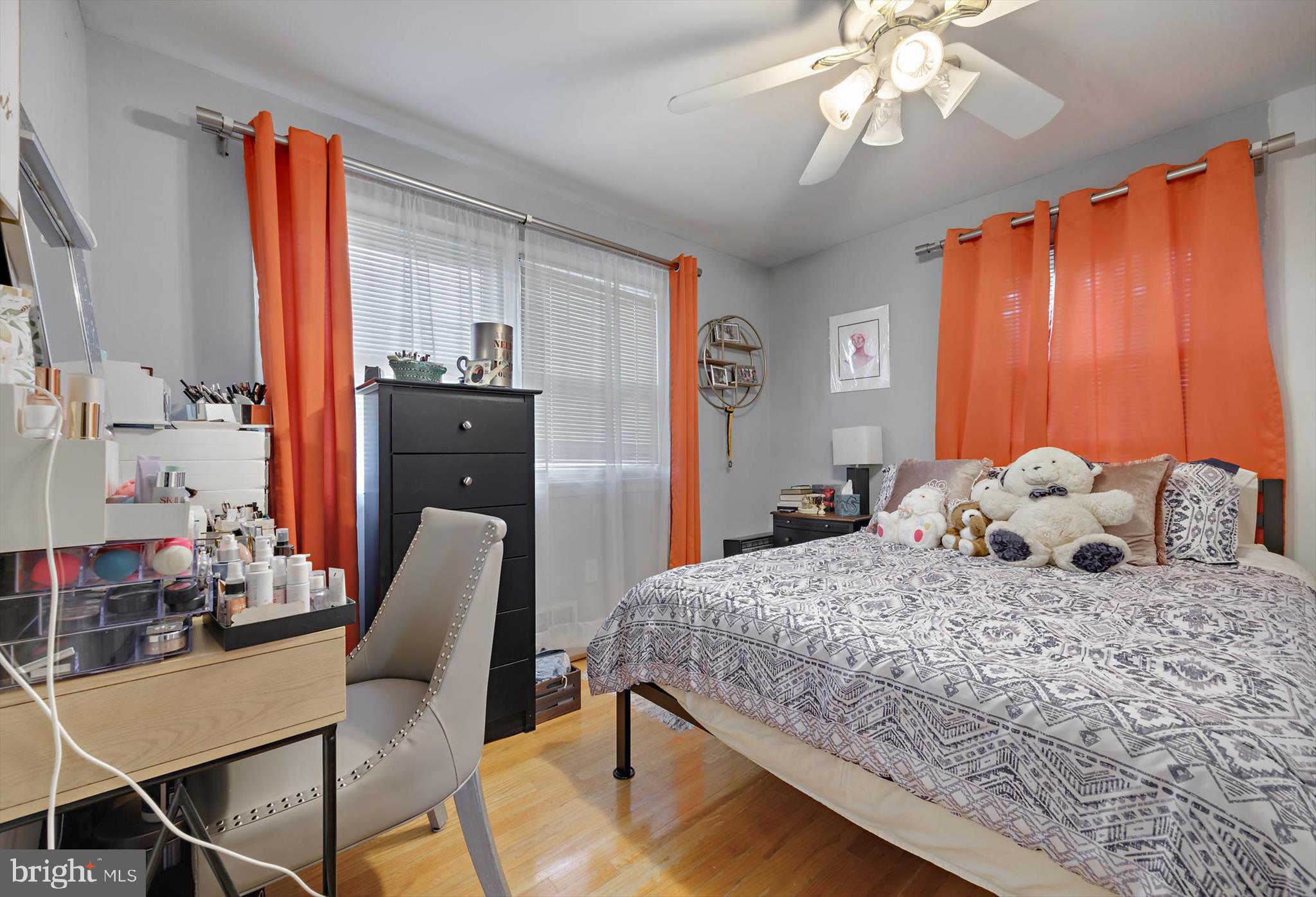 11406 Accolade Terrace Clinton, MD 20735 - Photo 14 of 45 a bedroom with a bed and a chandelier