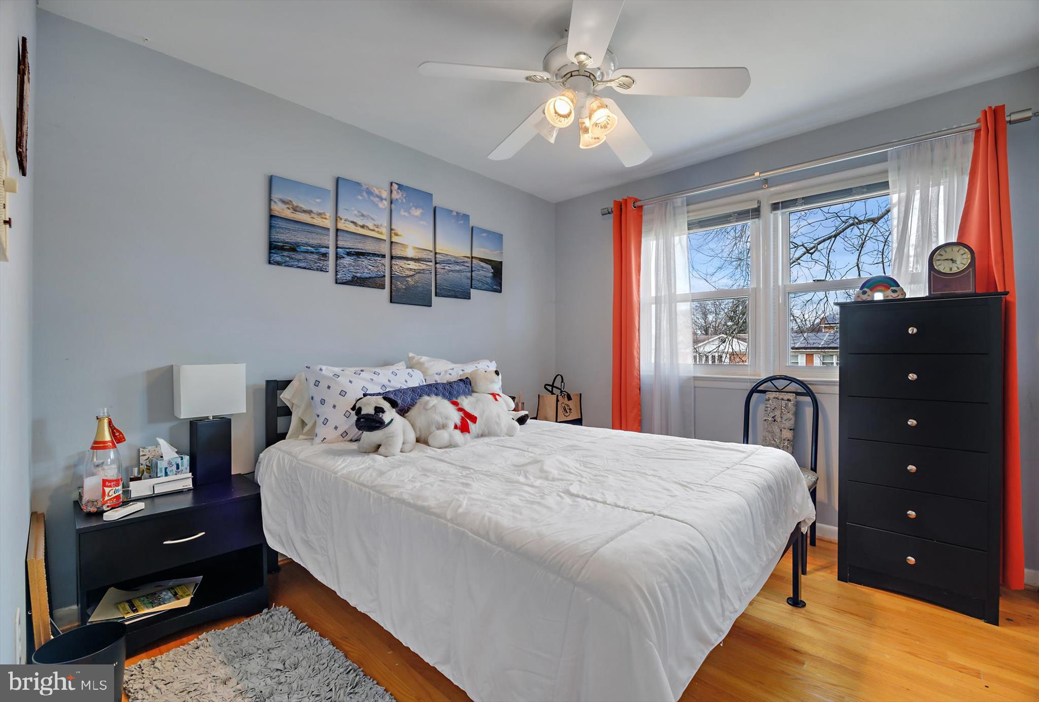 11406 Accolade Terrace Clinton, MD 20735 - Photo 16 of 45 a bedroom with a bed dresser and wooden floor