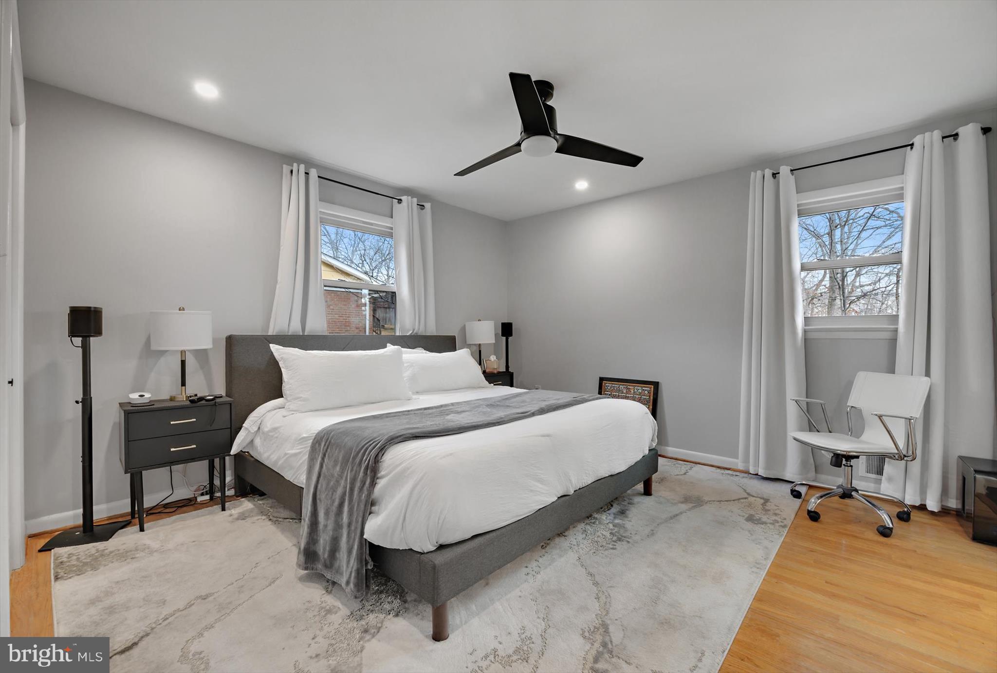 11406 Accolade Terrace Clinton, MD 20735 - Photo 19 of 45 a bedroom with bed and window with chair