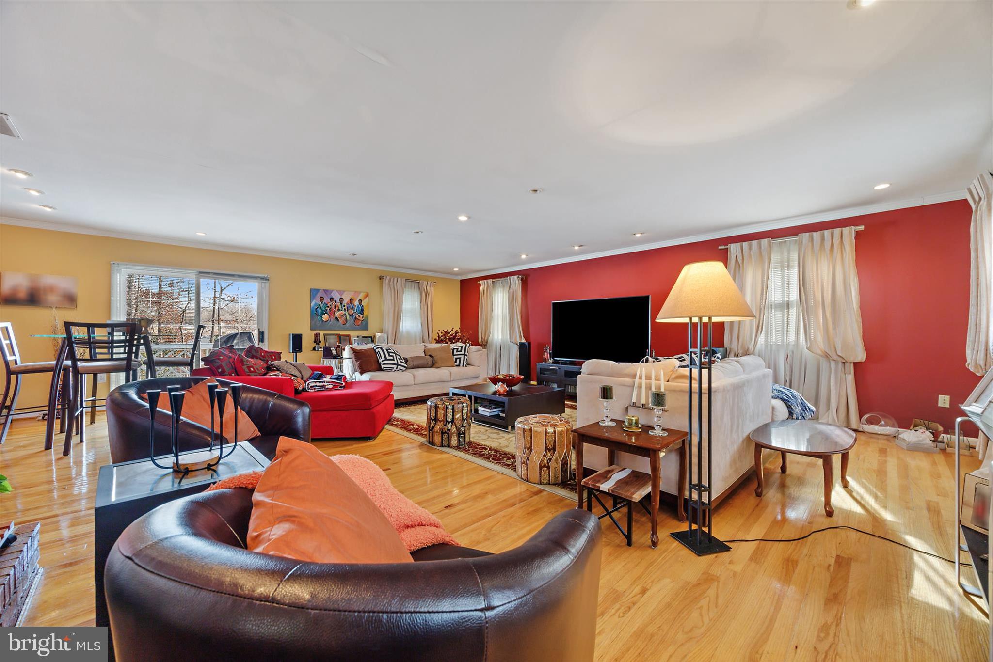 11406 Accolade Terrace Clinton, MD 20735 - Photo 26 of 45 a living room with furniture and a flat screen tv