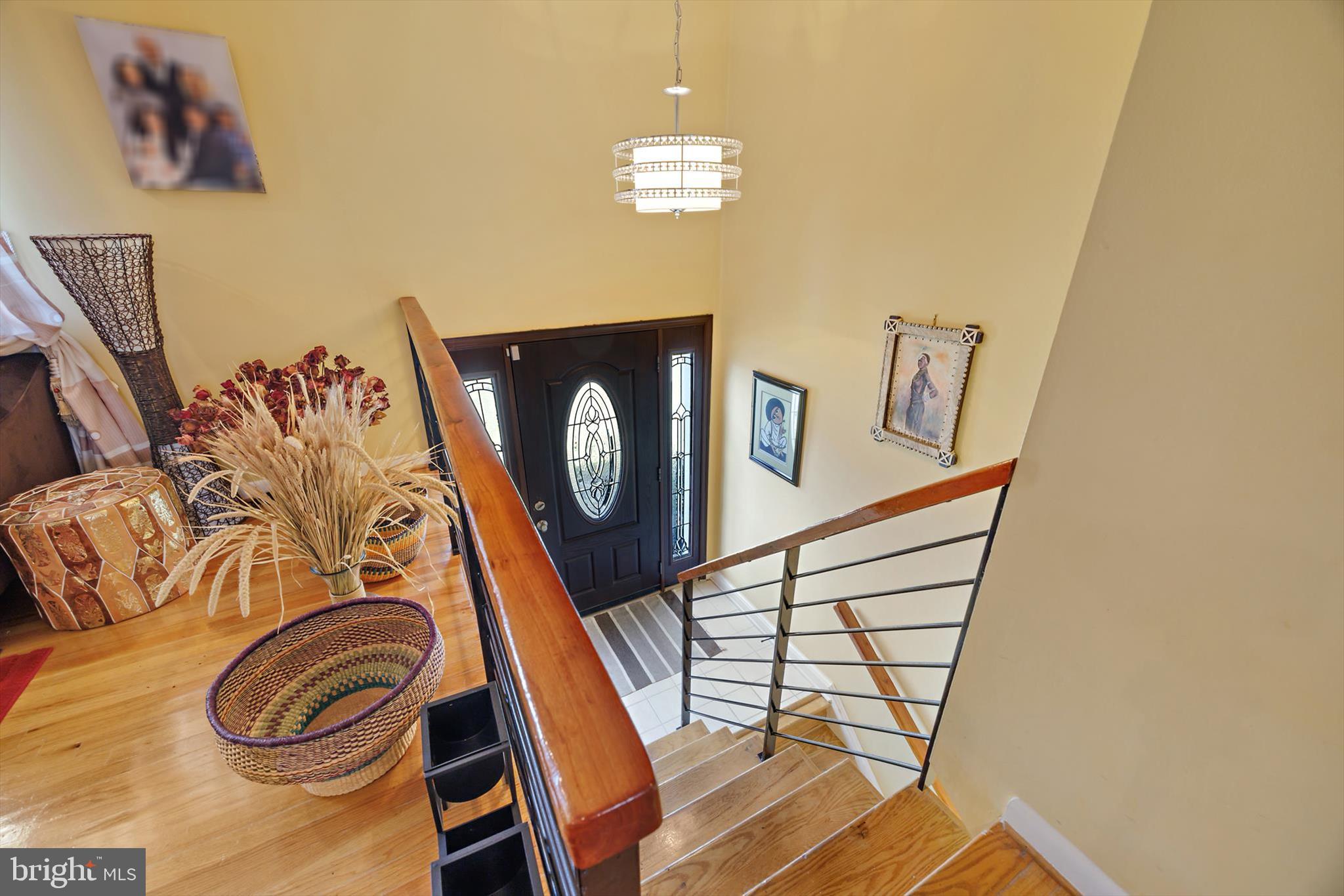 11406 Accolade Terrace Clinton, MD 20735 - Photo 3 of 45 a view of a storage & utility room with racks on the wall