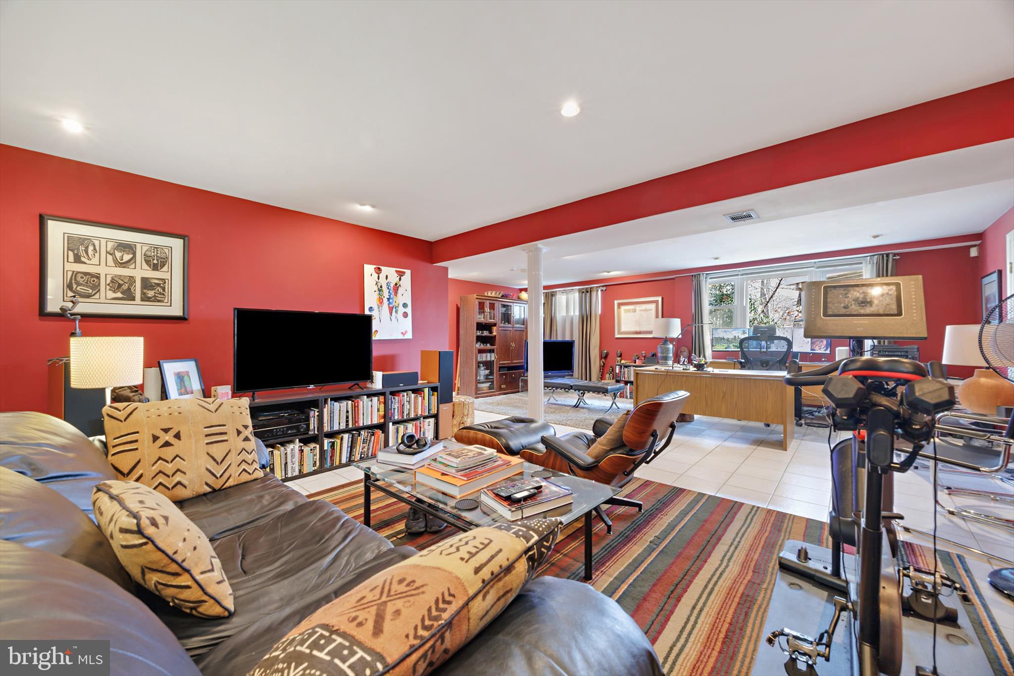 11406 Accolade Terrace Clinton, MD 20735 - Photo 37 of 45 a living room with furniture and a flat screen tv