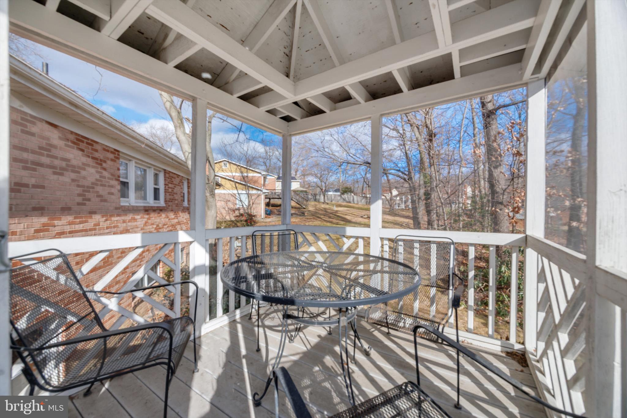 11406 Accolade Terrace Clinton, MD 20735 - Photo 39 of 45 a view of a room with wooden floor and windows