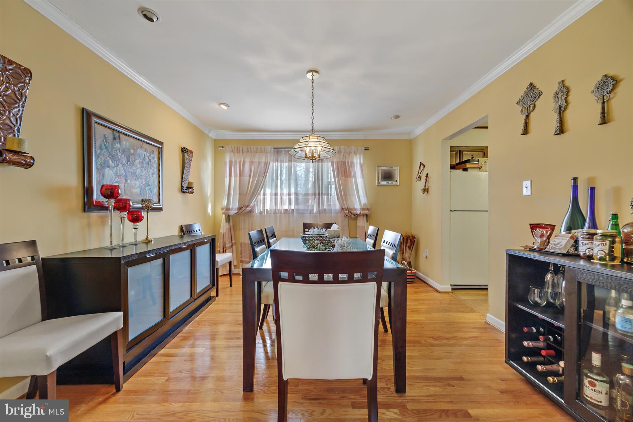 11406 Accolade Terrace Clinton, MD 20735 - Photo 7 of 45 a view of a dining room with furniture and window