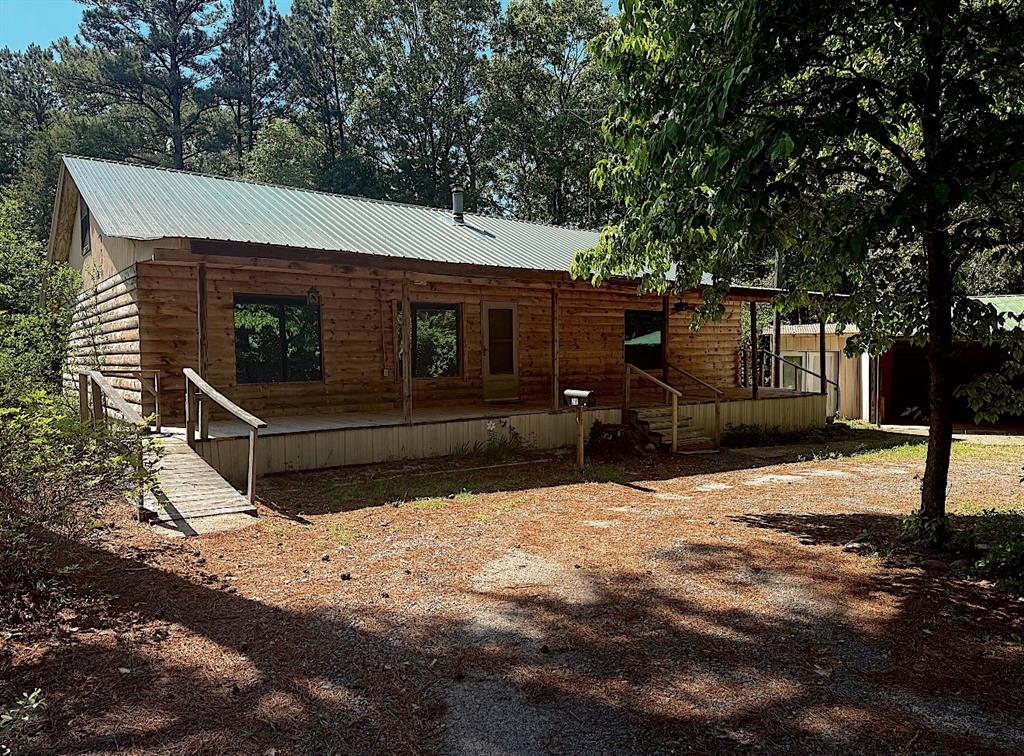 210 Whispering Pines Trail Minden, LA 71055 - Photo 2 of 16 Beautiful Log Cabin Home