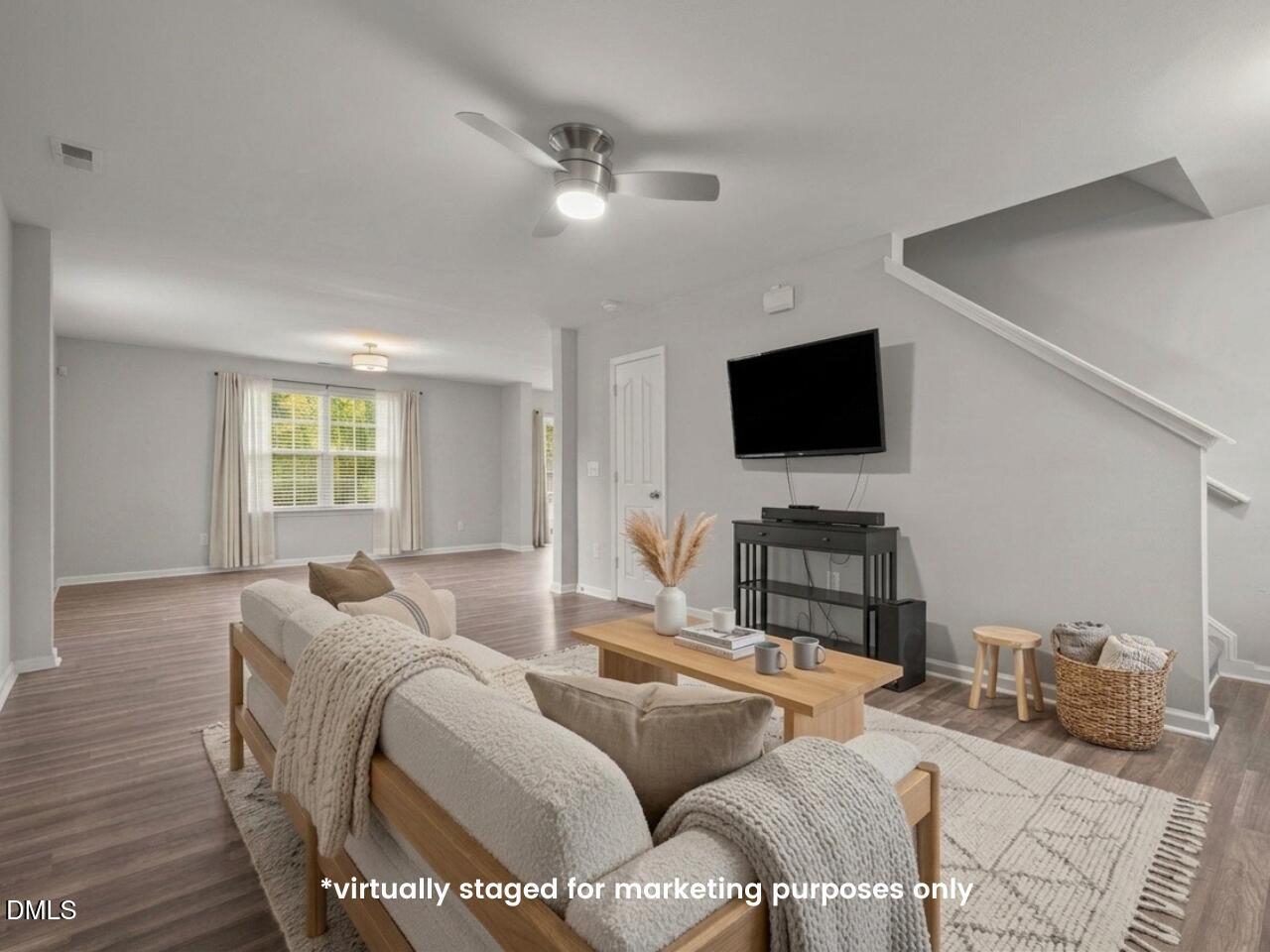 45 Crane Way Bunnlevel, NC 28323 - Photo 5 of 35 a living room with furniture and a flat screen tv