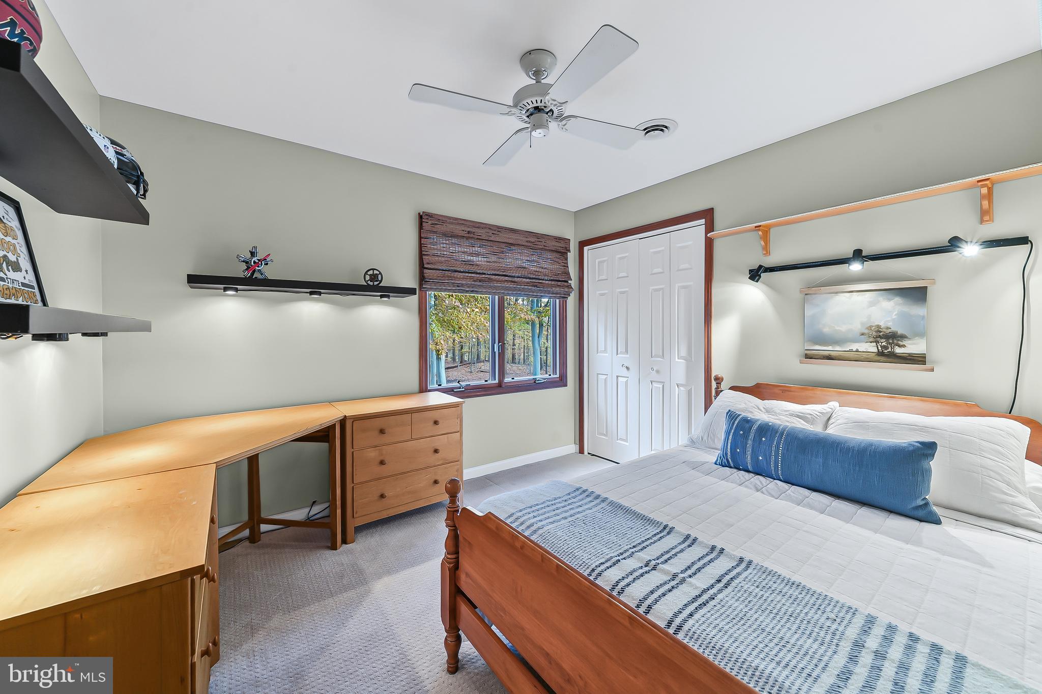 5 Copper Beech Court Landenberg, PA 19350 - Photo 29 of 38 a spacious bedroom with a bed and a chandelier