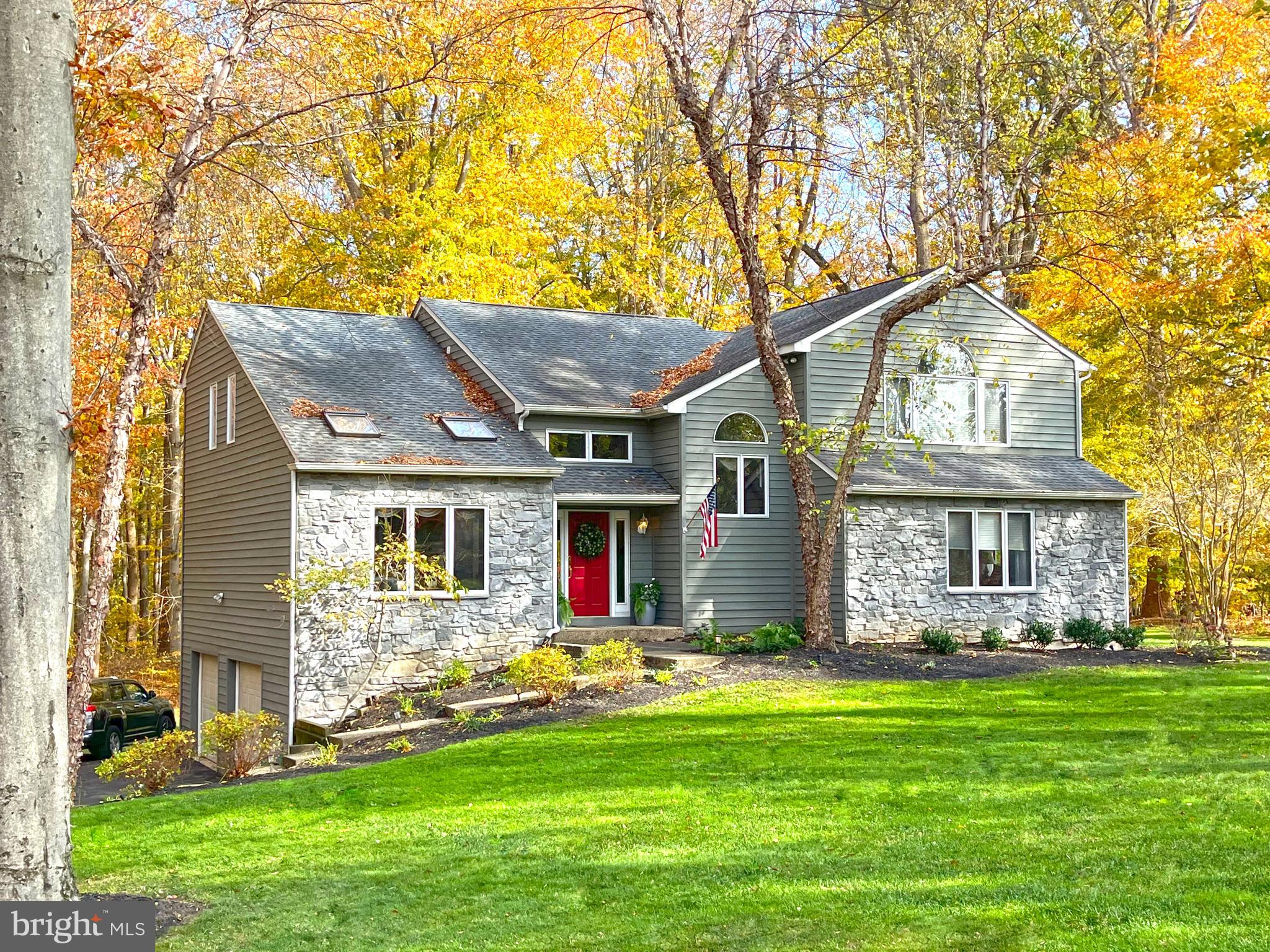 5 Copper Beech Court Landenberg, PA 19350 - Photo 33 of 38 a front view of house with yard and green space