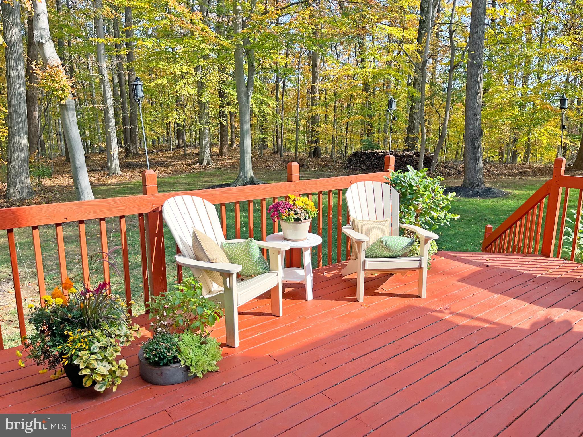 5 Copper Beech Court Landenberg, PA 19350 - Photo 36 of 38 a balcony with wooden floor and outdoor seating