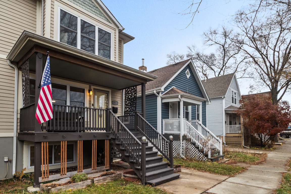 1811 Lyons Street Evanston, IL 60201 - Photo 32 of 33 a front view of a house with a balcony