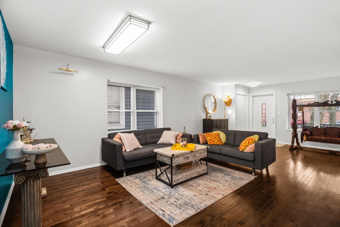 1811 Lyons Street Evanston, IL 60201 - Photo 6 of 33 a living room with furniture and wooden floor