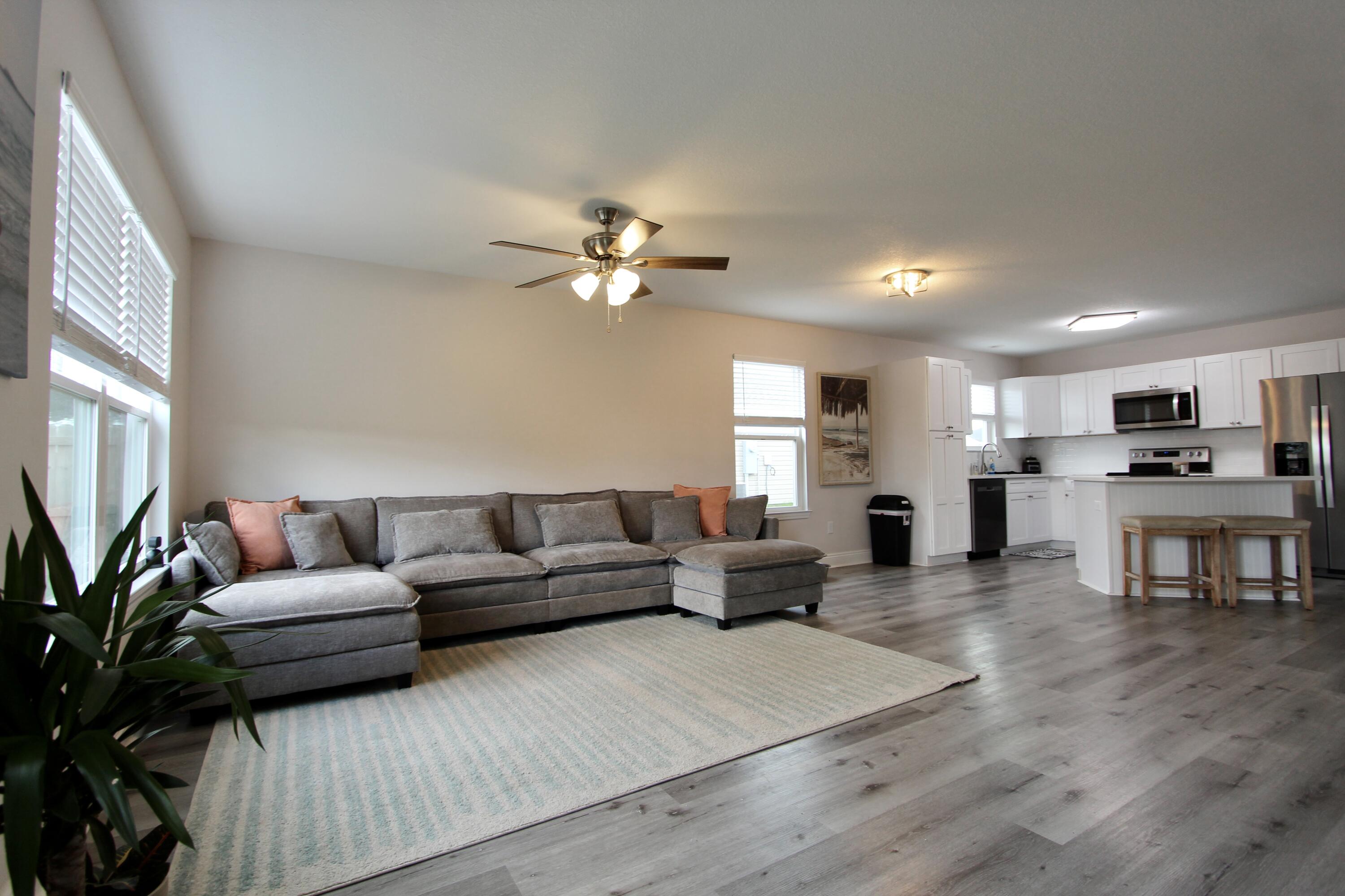 5366 Highview Drive Crestview, FL 32539 - Photo 11 of 19 a living room with furniture and kitchen view