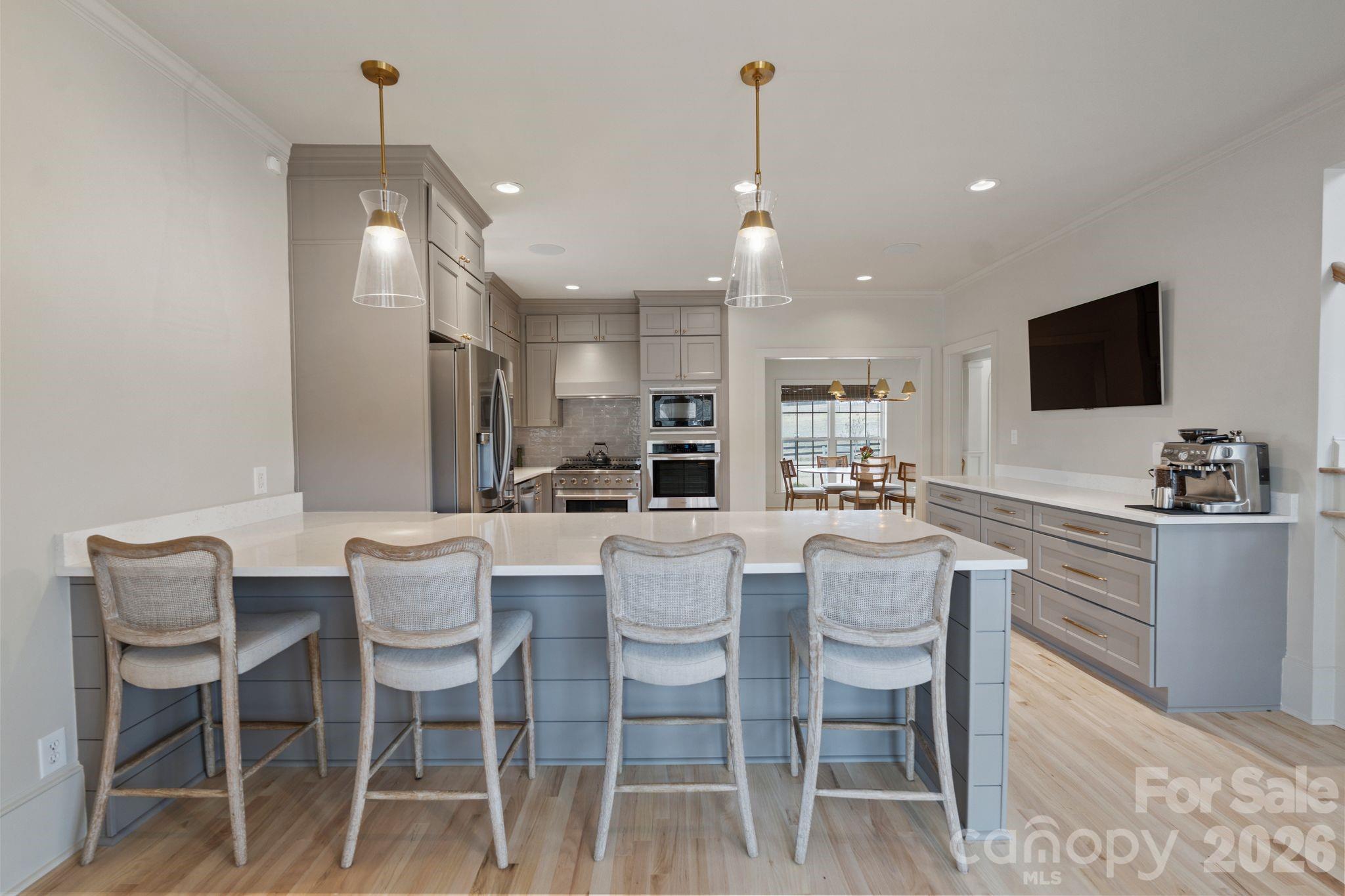 940 State Rd S-13-106 Pageland, SC 29728 - Photo 11 of 41 a large kitchen with a table and chairs