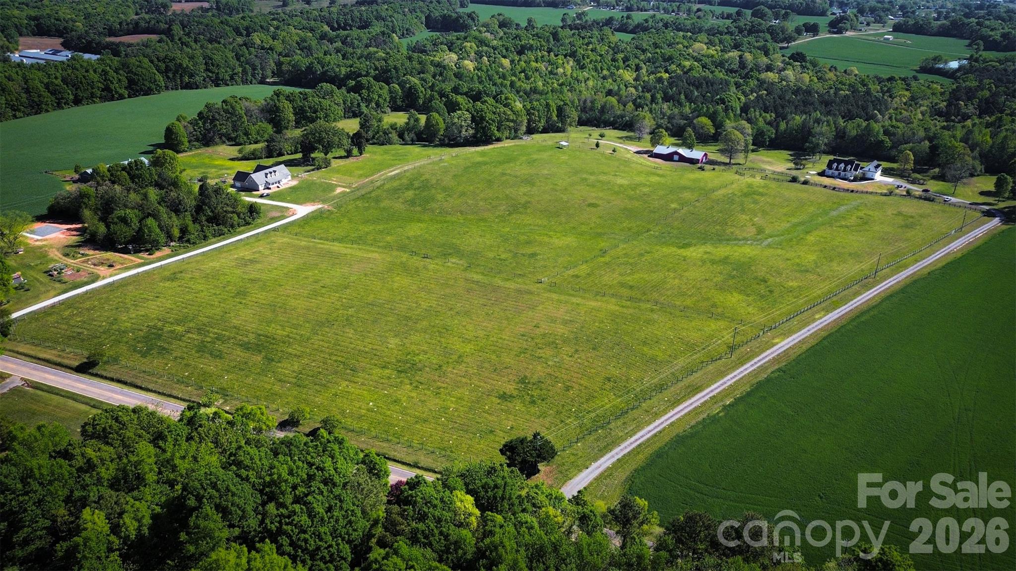 940 State Rd S-13-106 Pageland, SC 29728 - Photo 34 of 41 a view of a field with plants