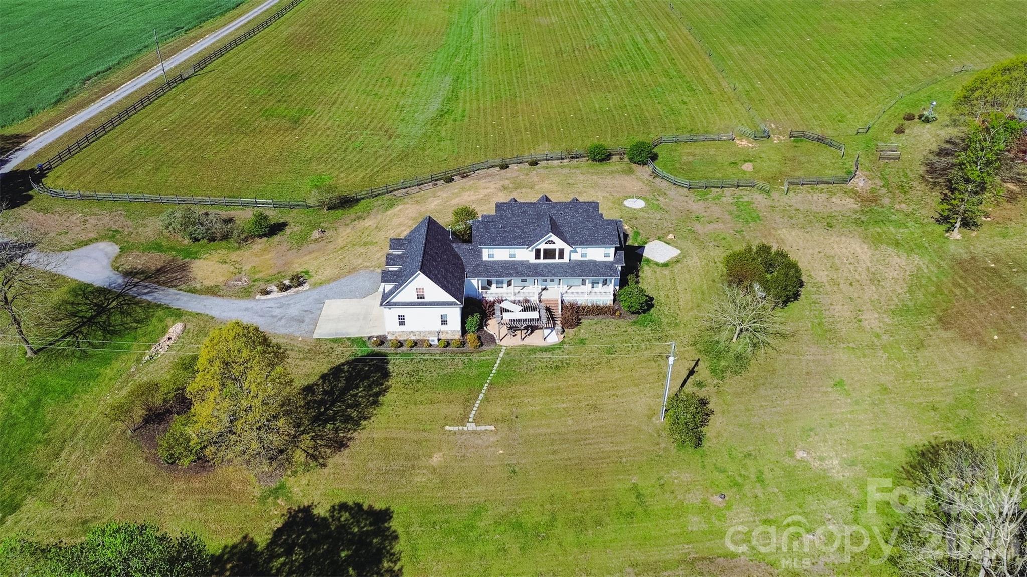 940 State Rd S-13-106 Pageland, SC 29728 - Photo 39 of 41 an aerial view of a house with a yard basket ball court