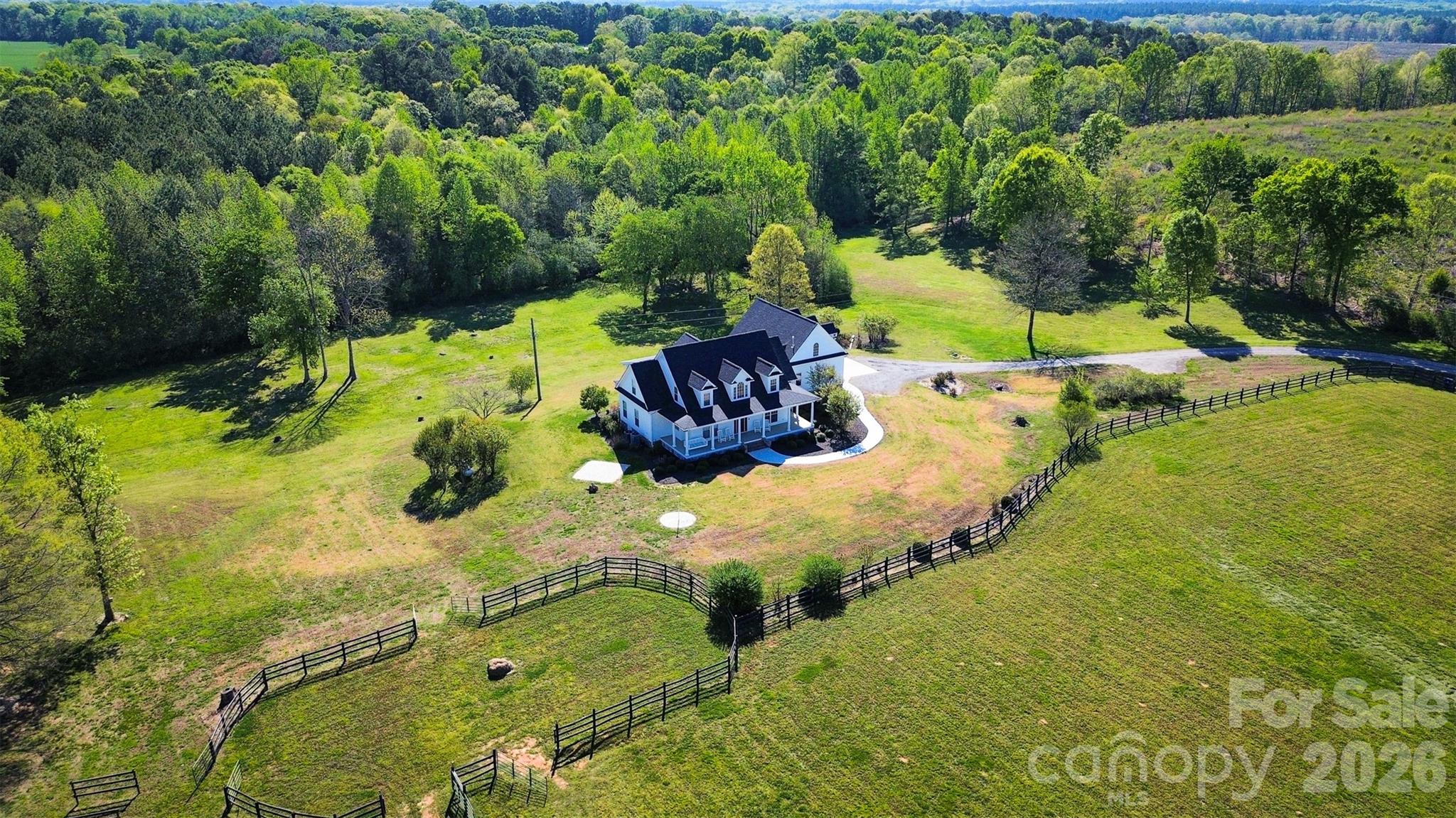 940 State Rd S-13-106 Pageland, SC 29728 - Photo 40 of 41 a view of a garden with swimming pool