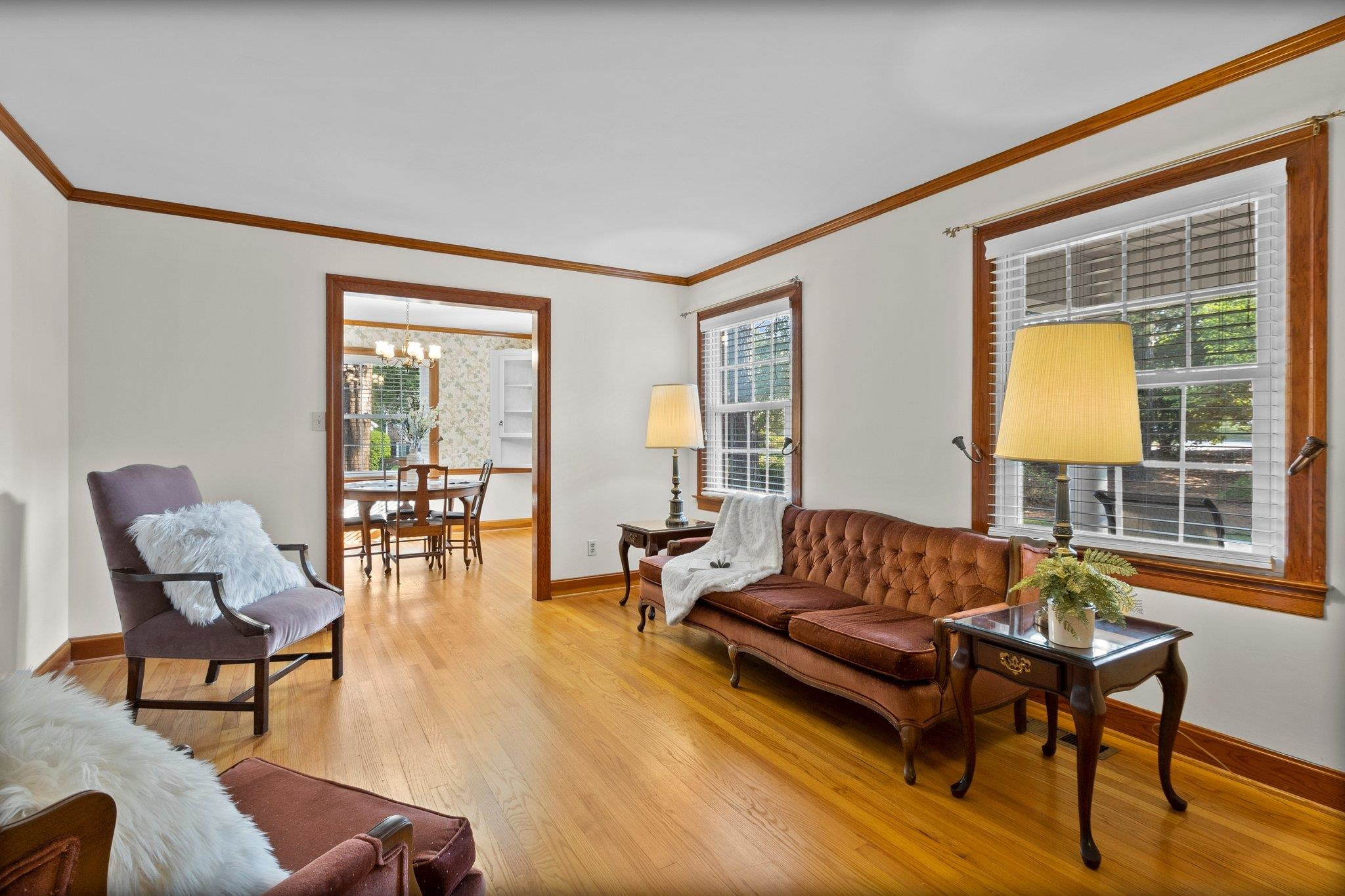 Living Room with large windows and wood trim work. Living Room