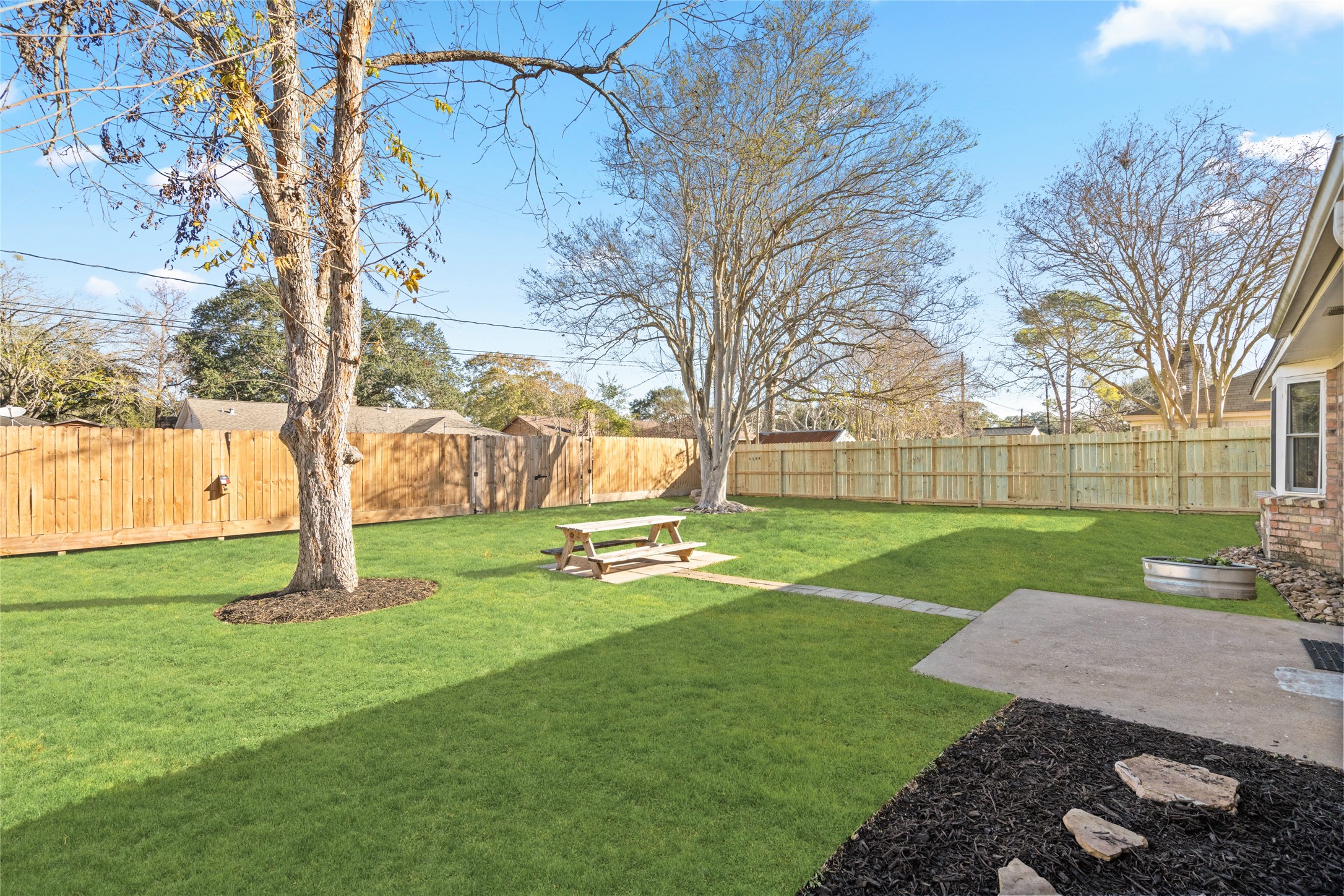 3603 Glenmeadow Drive Rosenberg, TX 77471 - Photo 26 of 27 a garden with trees and a lake view