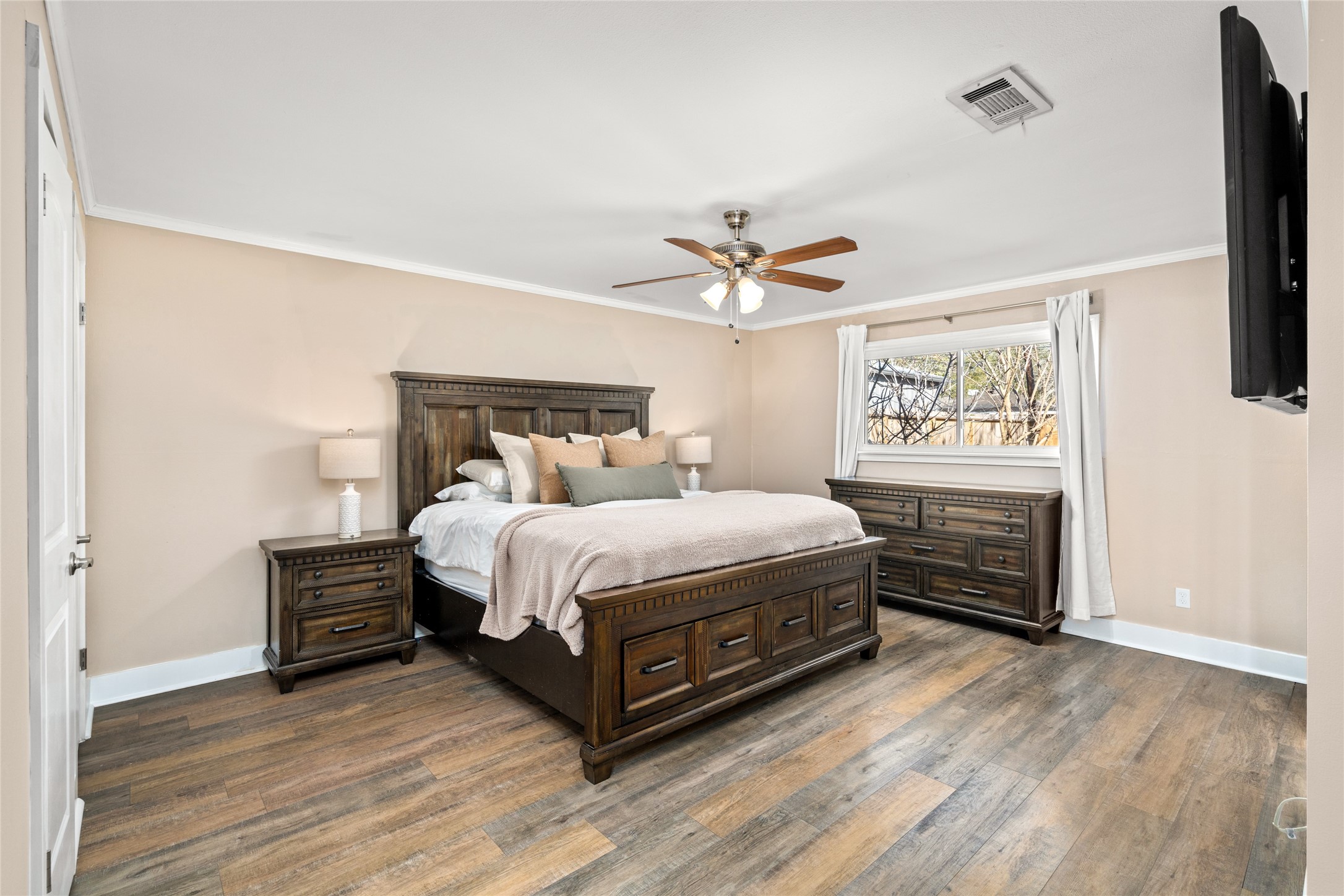 3603 Glenmeadow Drive Rosenberg, TX 77471 - Photo 6 of 27 a bedroom with a bed and a flat screen tv