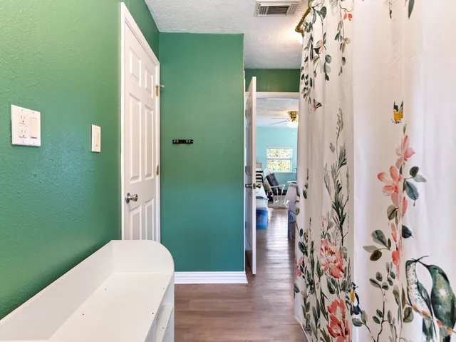 a bathroom with a sink and toilet