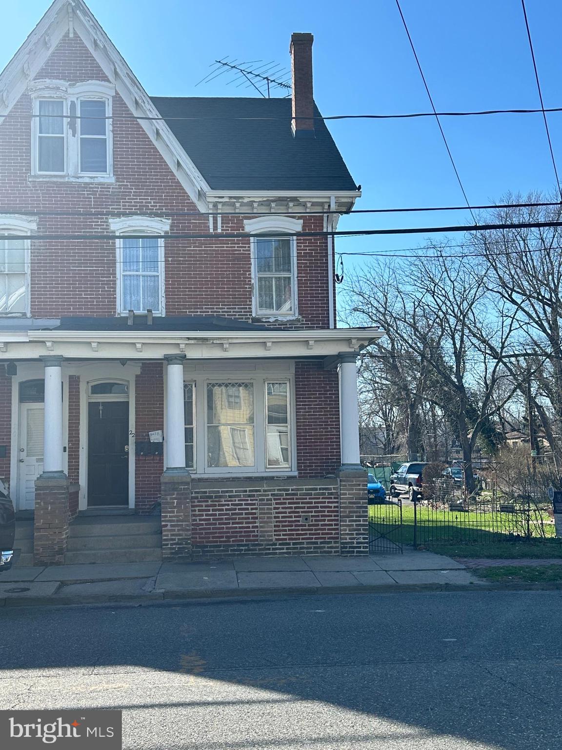 22 Bispham Street, Unit B Mount Holly, NJ 08060 - Photo 1 of 1 a front view of a house with a garden