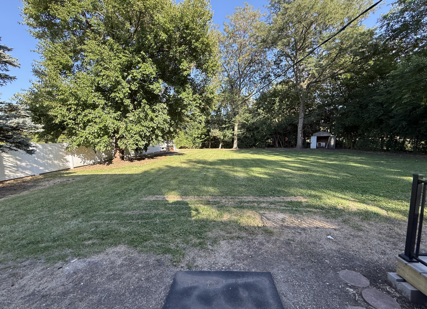 59 9s115 Route, Unit 1 Naperville, IL 60564 - Photo 11 of 12 a view of a field with grass and a trees