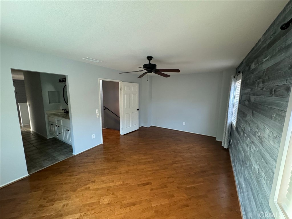 31781 Canyon Estates Drive Lake Elsinore, CA 92532 - Photo 11 of 25 wooden floor in an empty room