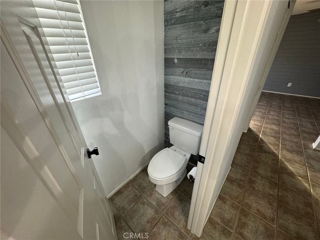 31781 Canyon Estates Drive Lake Elsinore, CA 92532 - Photo 15 of 25 a bathroom with a toilet and a shower
