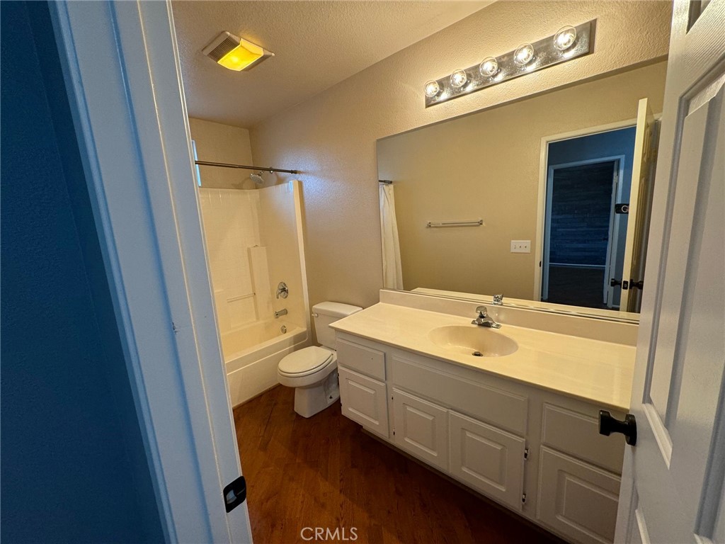 31781 Canyon Estates Drive Lake Elsinore, CA 92532 - Photo 19 of 25 a bathroom with a sink and a mirror