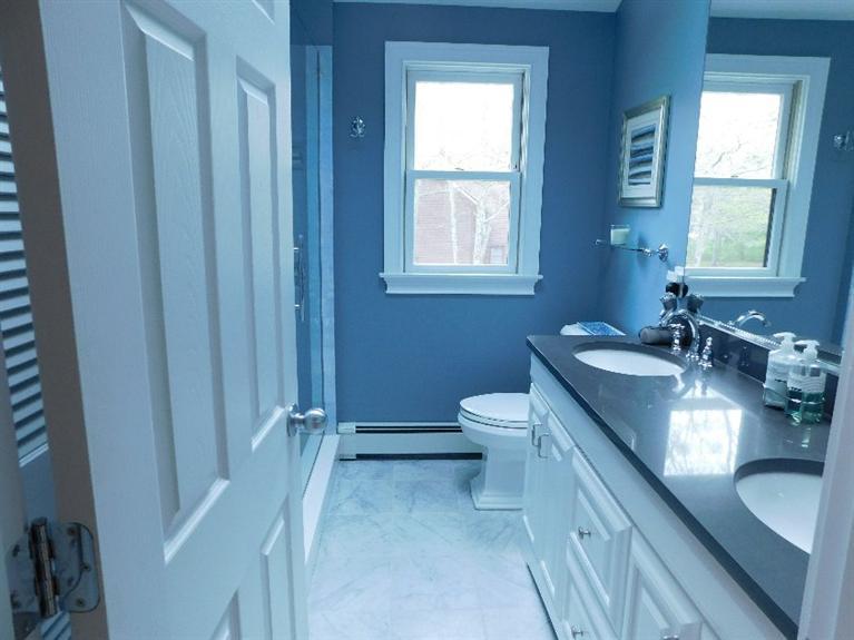 62 Quisset Road Centerville, MA 02632 - Photo 17 of 25 a bathroom with a granite countertop sink toilet and shower