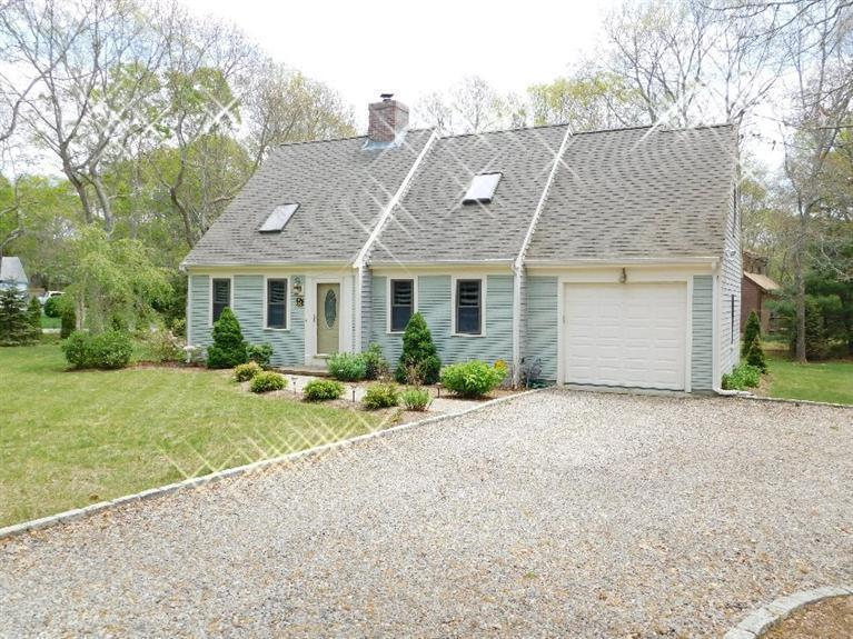 62 Quisset Road Centerville, MA 02632 - Photo 25 of 25 front view of a house with a yard