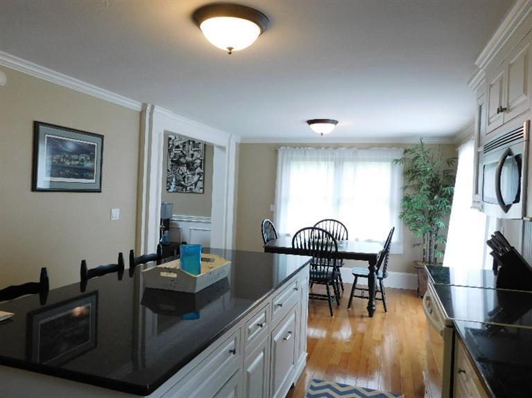 62 Quisset Road Centerville, MA 02632 - Photo 9 of 25 a living room with furniture a dining table and a piano