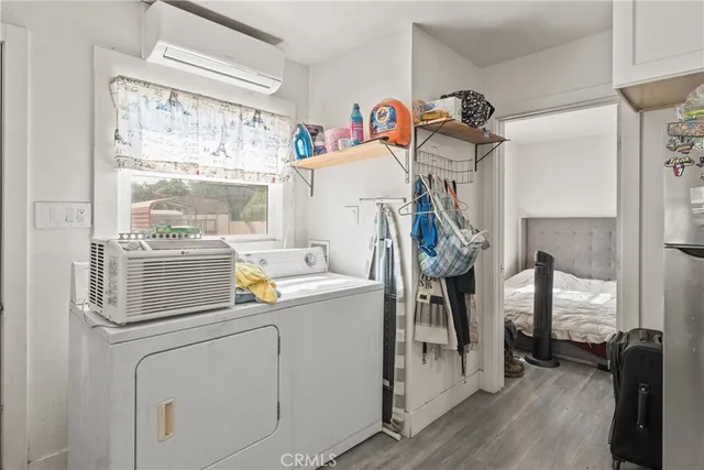 a storage room with washer and dryer