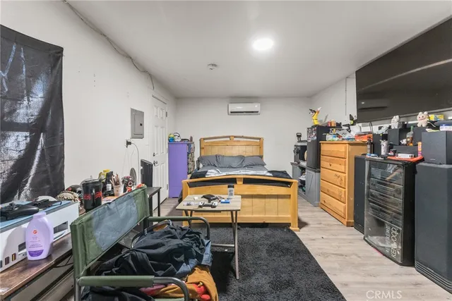 a room with furniture and wooden floor