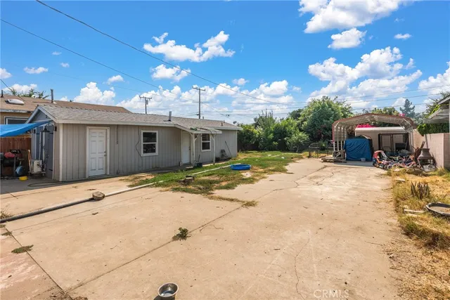 a view of a house with a patio