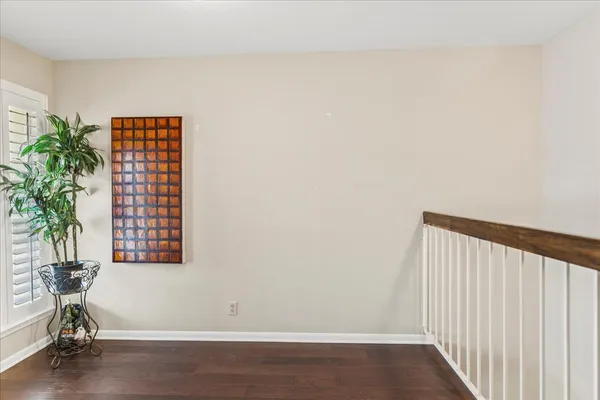 a work room with furniture and windows