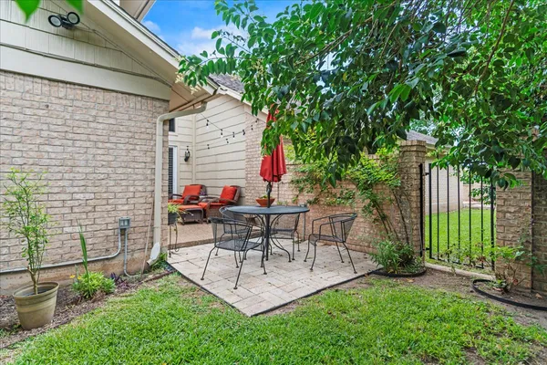a outdoor living space with furniture and a potted plant