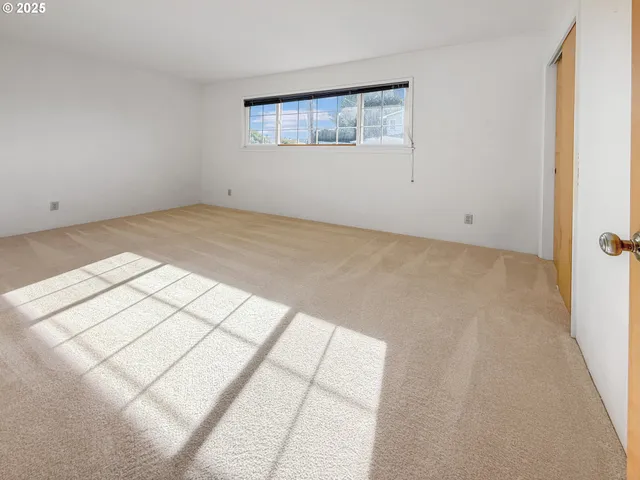 a view of a room with an empty space