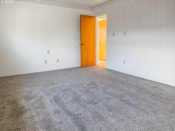 an empty room with a natural light