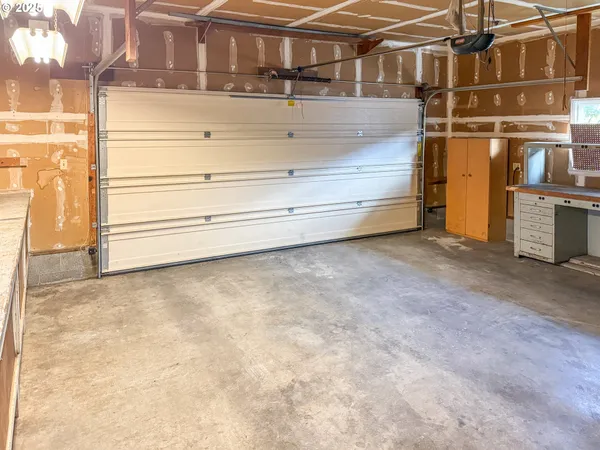 a view of a room with wooden walls