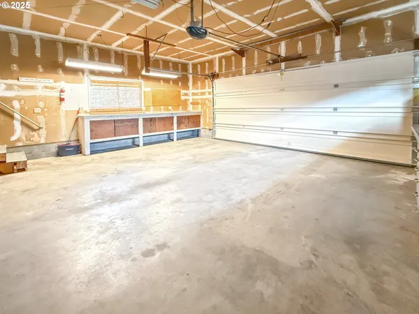 a view of a room with wooden walls