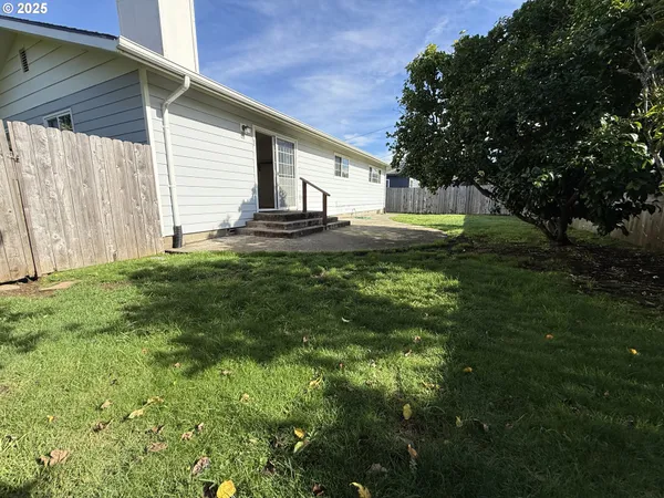 a view of a house with a garden