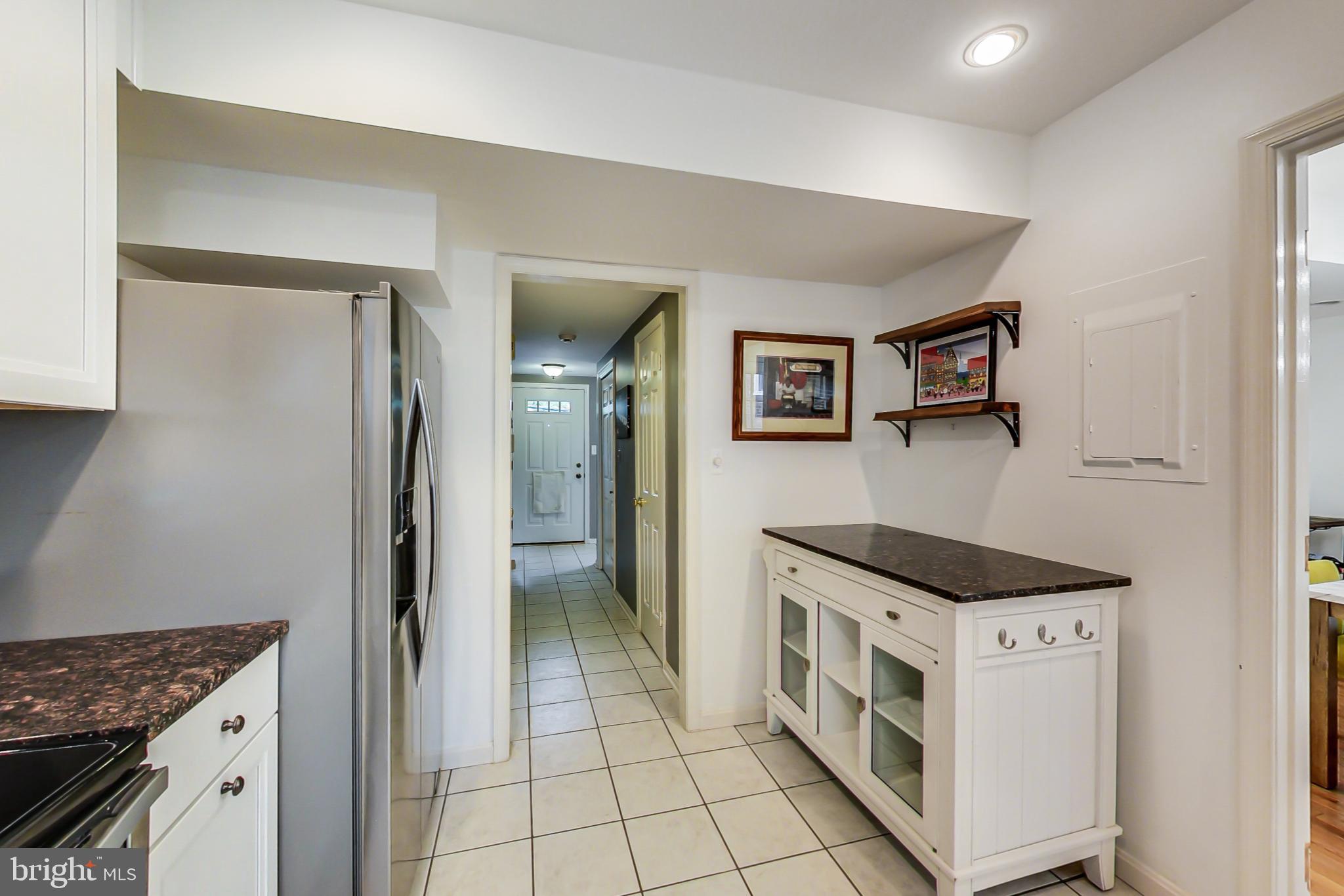 6718 Hillandale Road, Unit 16 Chevy Chase, MD 20815 - Photo 11 of 32 Alternate View from Inside the Kitchen