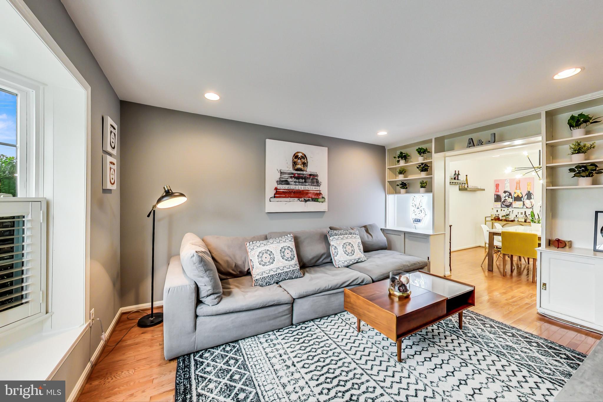 6718 Hillandale Road, Unit 16 Chevy Chase, MD 20815 - Photo 3 of 32 Spacious Family Room w/ Built-ins