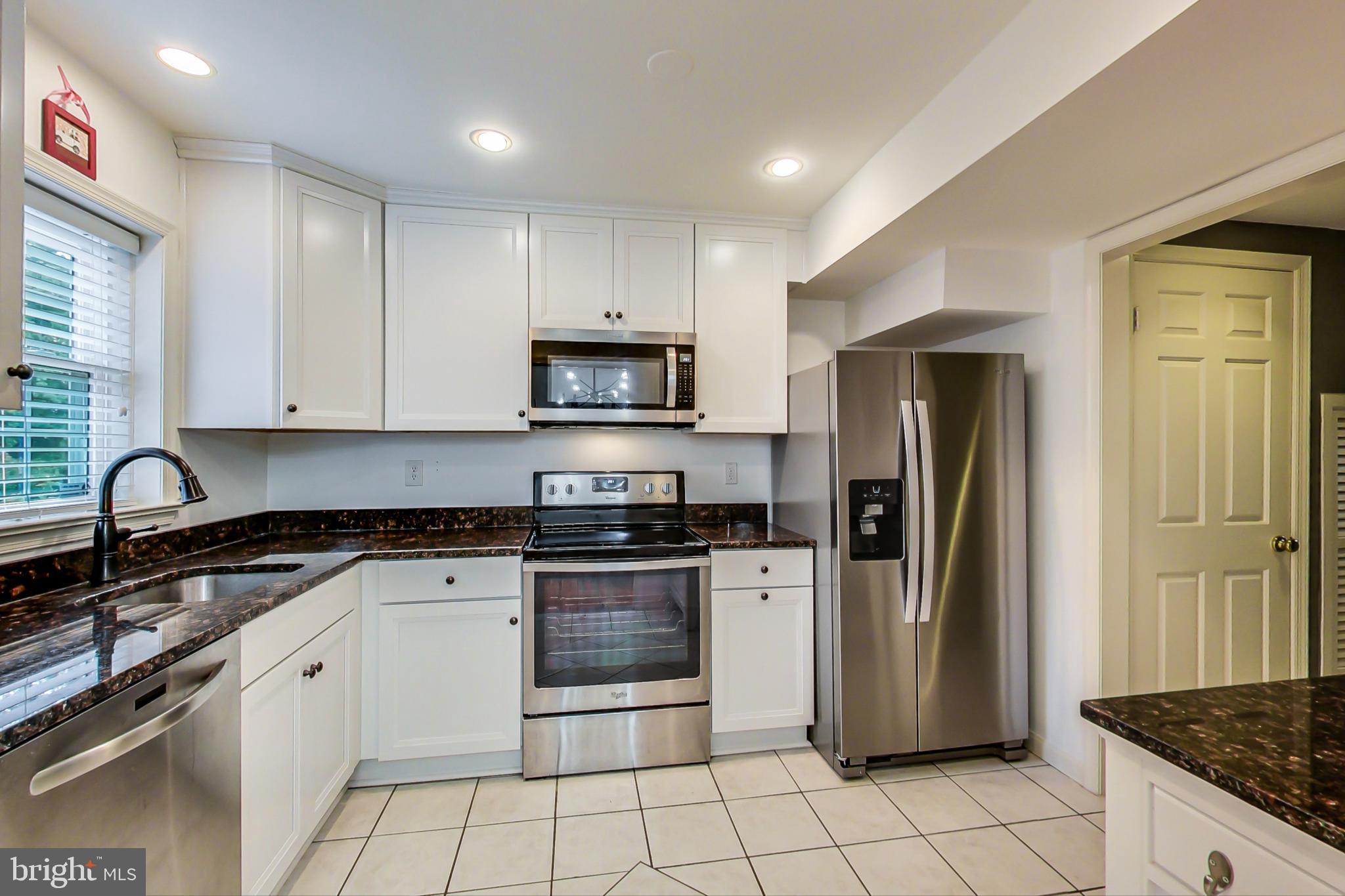 6718 Hillandale Road, Unit 16 Chevy Chase, MD 20815 - Photo 9 of 32 Beautiful Kitchen w/ Stainless Steel Appliances